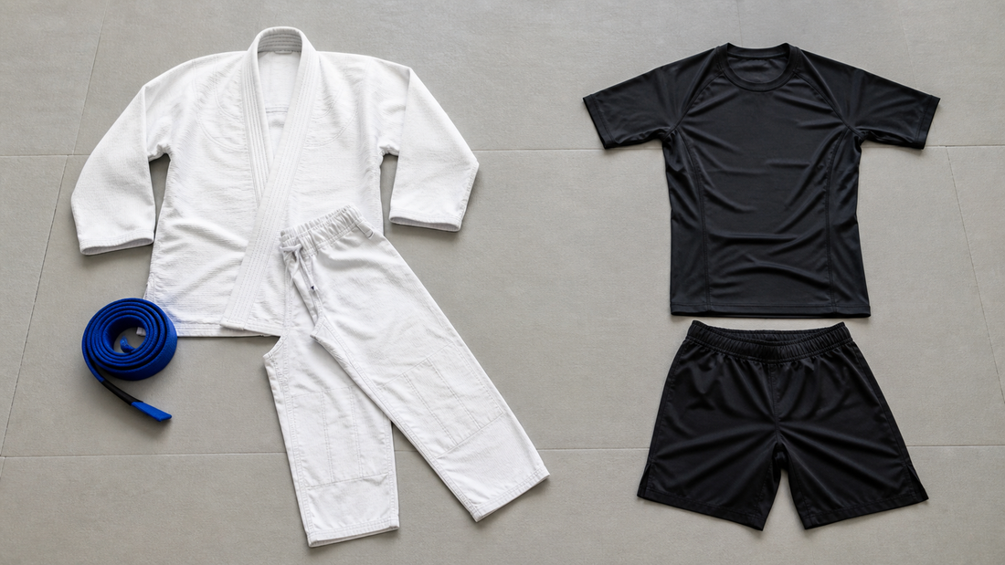 A complete gi uniform beside a no-gi rashguard and grappling shorts