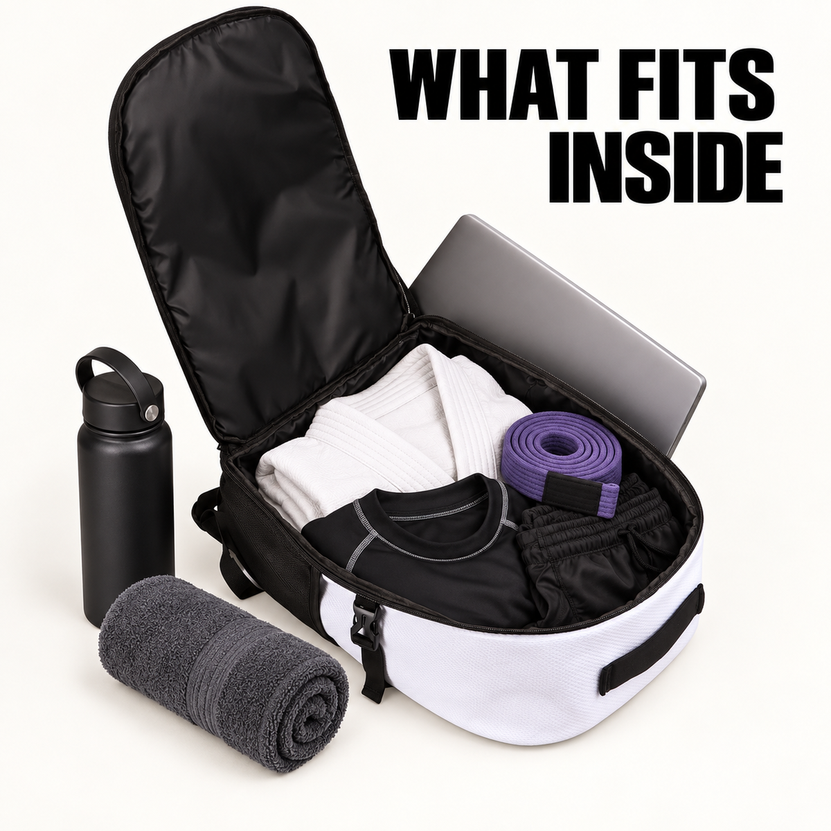 Open Large Graded BJJ Backpack packed with a gi, belt, rashguard, shorts, towel, water bottle and laptop.